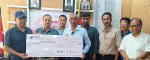 धरानको मितेरी बैंक र व्यापारीले गरे कोषमा १३ लाख सहयोग